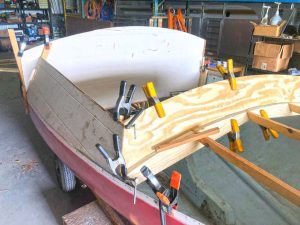 the forward cabin face is installed, with deck beams running to the forward bulkhead. The cabin sides and aft bulkheads are mocked up using 1/8-inch paneling salvaged from a friend.