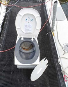 Drew used a pair of battery boxes to make the lower part. The unit would be enclosed in a well, but he wanted the toilet to have a smooth, well-finished interior.