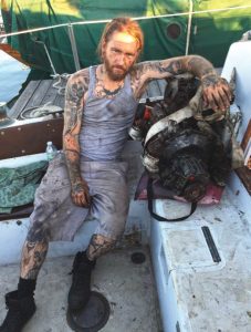 a weary-looking James afterremoving the boat’s old engine.