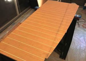 Bulkhead with grooves routered.