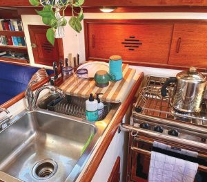 Working as a dish rack of sorts, the board has a slight angle to drain into the sink.