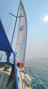 Motor-sailing with the jib above Tobermory, heading toward the Wingfield Basin.