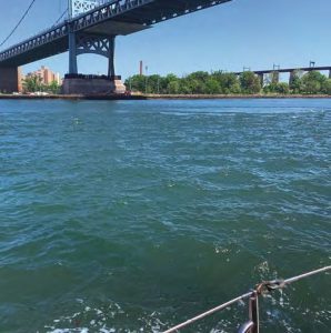 Hell Gate in the East River. Note the“wind line” in the water, marking the line
between still water and the tidal current
that was pushing Tomfoolery at nearly 4
knots, above.
